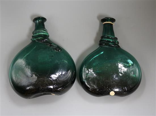 Two 17th century green glass bottles